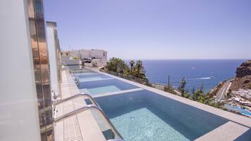 Roupas de cama antialérgicas, cofres nos quartos, cortinas blackout