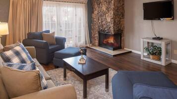 Flat-screen TV, DVD player, table football, ping pong