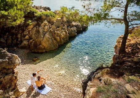 On the beach. Valamar Carolina Hotel & Villas