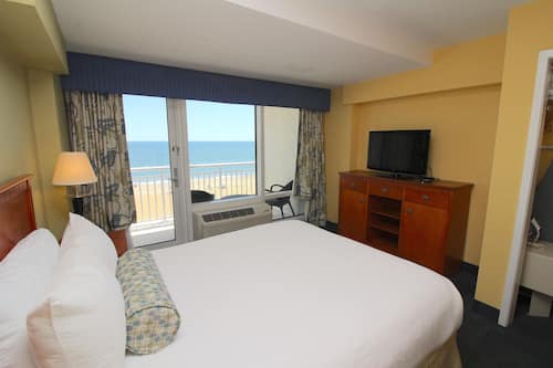 1 bedroom, premium bedding, blackout drapes, iron/ironing board