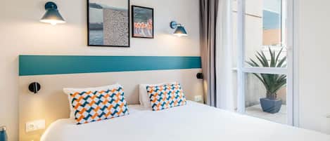 Apartament, 1 dormitori, balcó | Caixa forta a l'habitació, mobiliari individual i escriptori