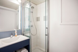 Eco-friendly toiletries, hair dryer, towels