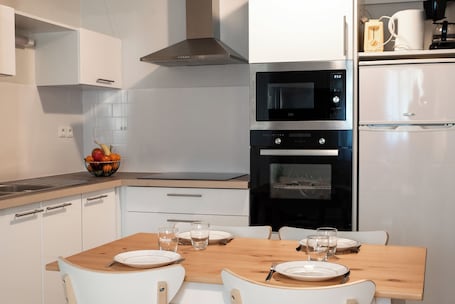 One-Bedroom Apartment | Private kitchenette | Fridge, microwave, stovetop, highchair