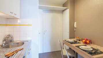 Apartment | Private kitchen | Fridge, microwave, stovetop, coffee/tea maker