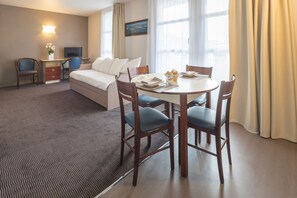 Superior Apartment, 2 Bedrooms | Living area | Flat-screen TV