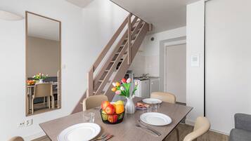 Standard Apartment | Living area | Flat-screen TV