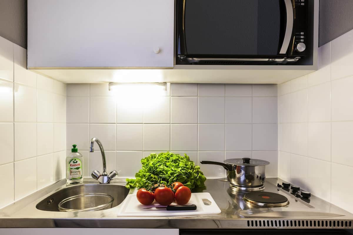 Desk, soundproofing, iron/ironing board, free cribs/infant beds