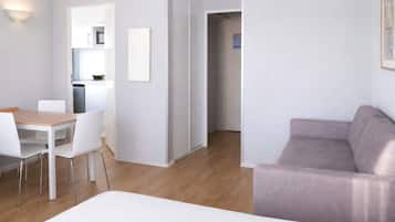 Desk, soundproofing, iron/ironing board, free cribs/infant beds