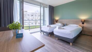 Huone, 2 yhden hengen sänkyä, tupakointi kielletty (Upgrade) | Työpöytä, äänieristys, silitysrauta/-lauta, ilmainen Wi-Fi