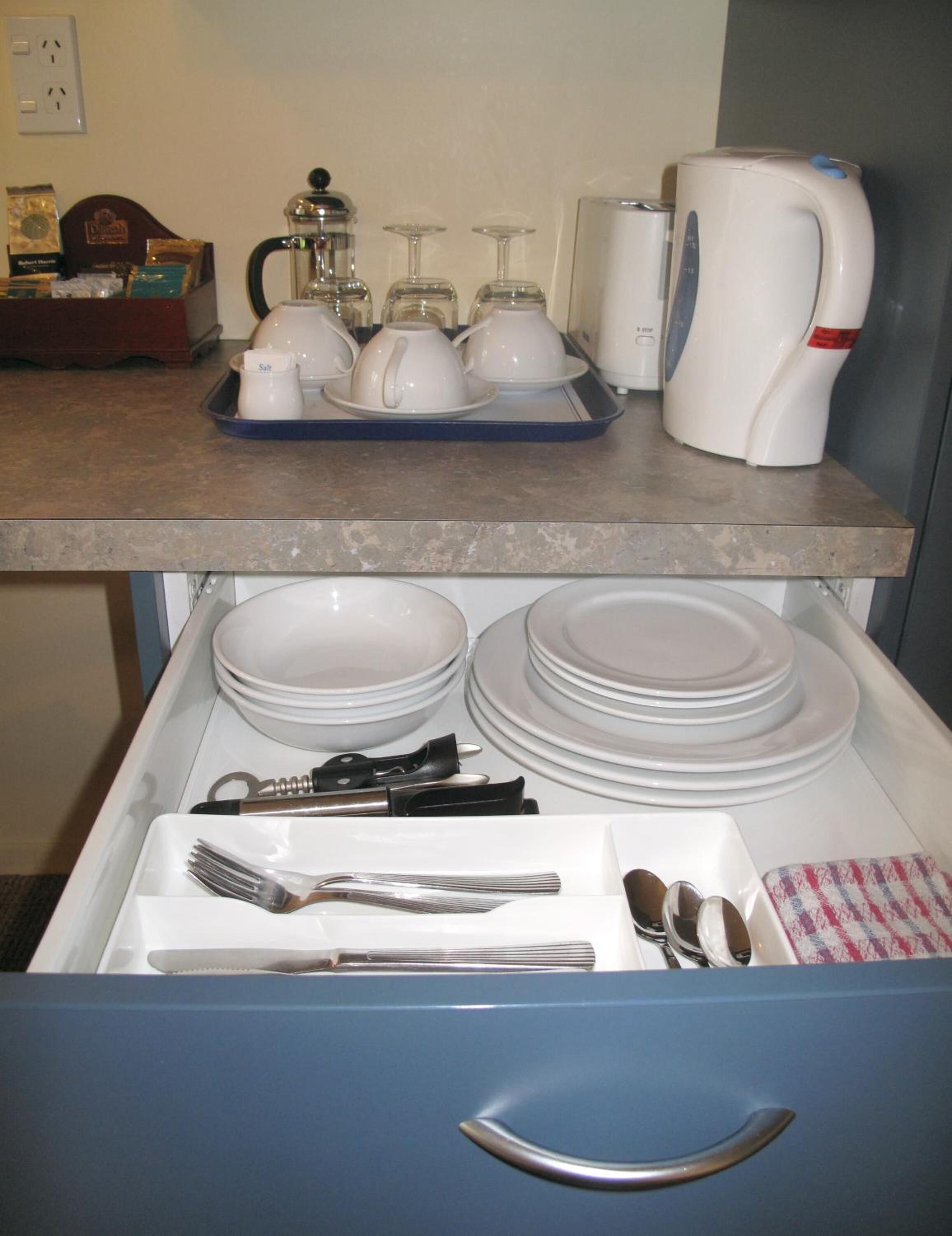 fridge, microwave, electric kettle, cookware/dishes/utensils