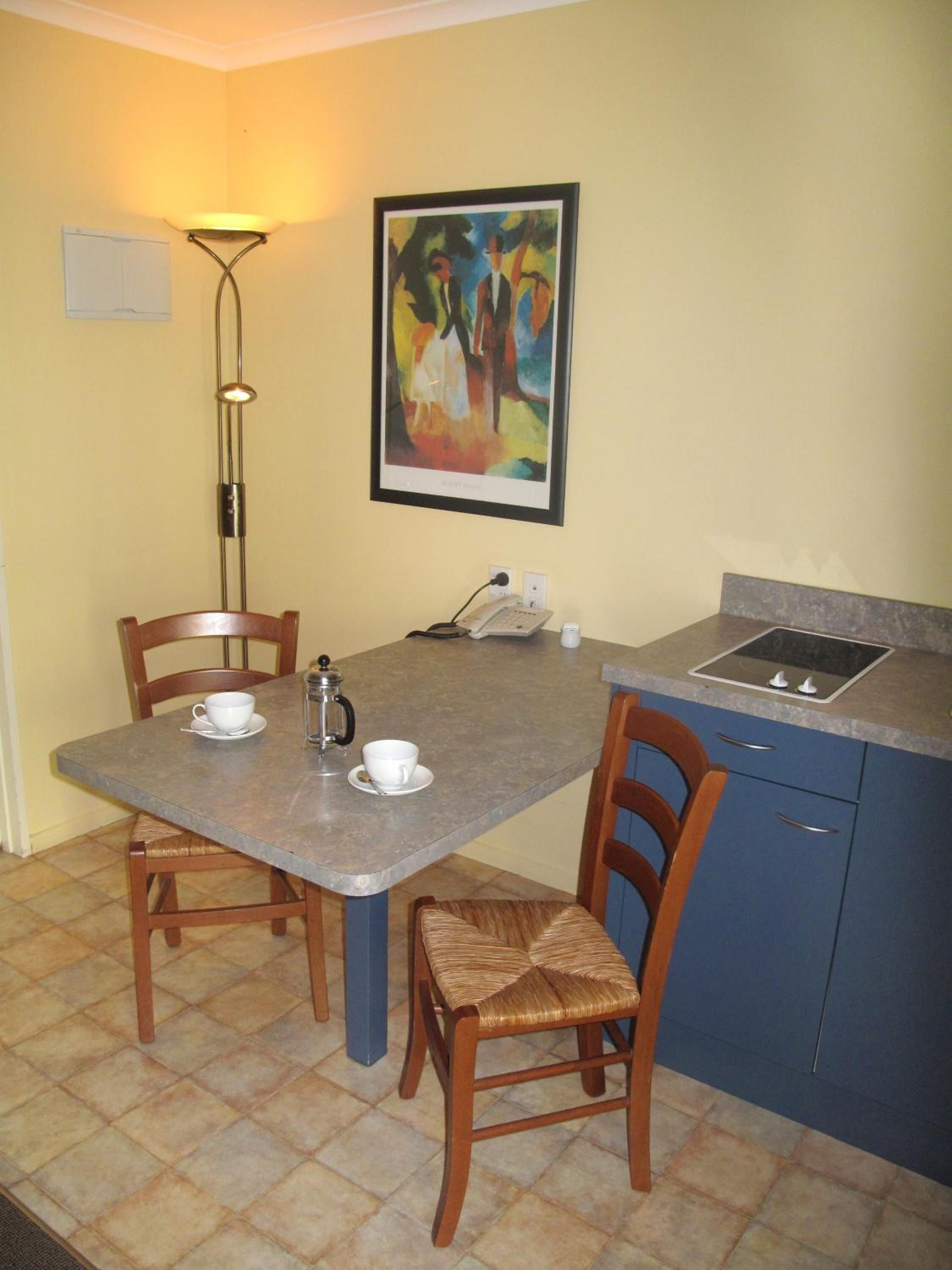 fridge, microwave, electric kettle, cookware/dishes/utensils