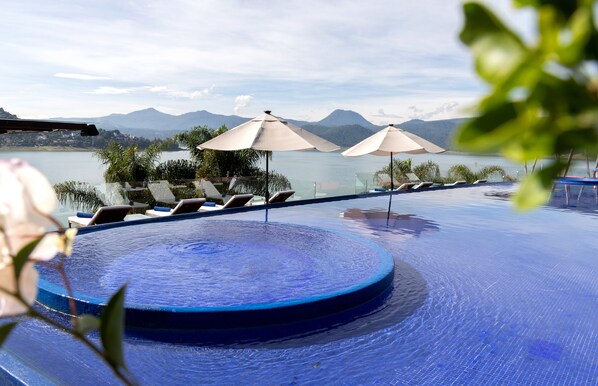 2 outdoor pools, pool umbrellas, sun loungers