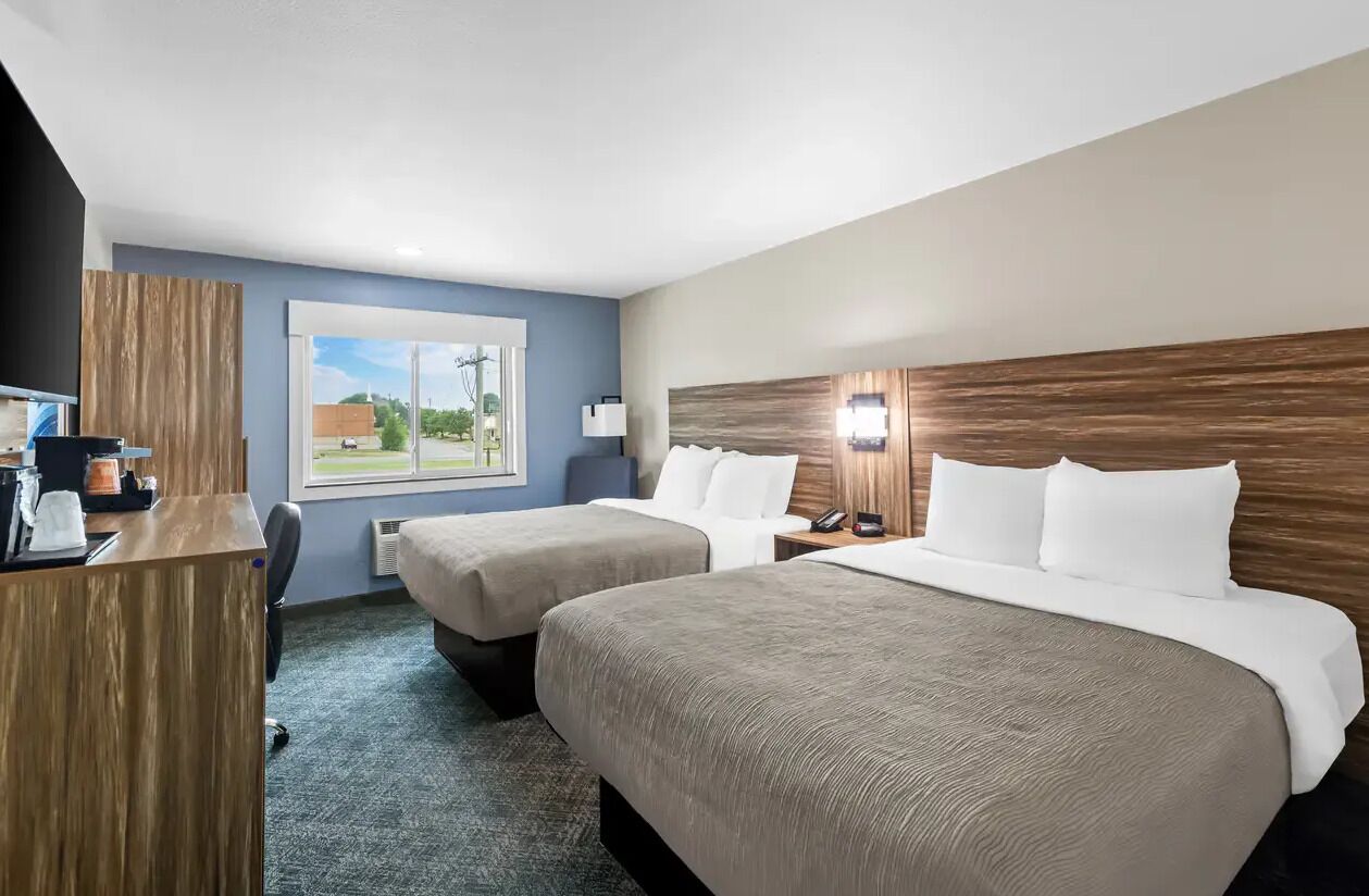 Premium bedding, down comforters, desk, laptop workspace