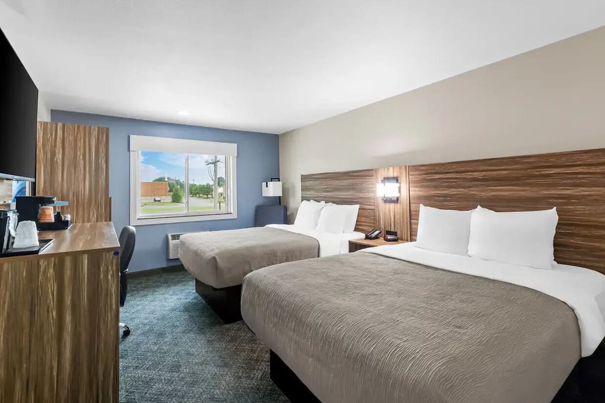 Premium bedding, down duvets, desk, laptop workspace