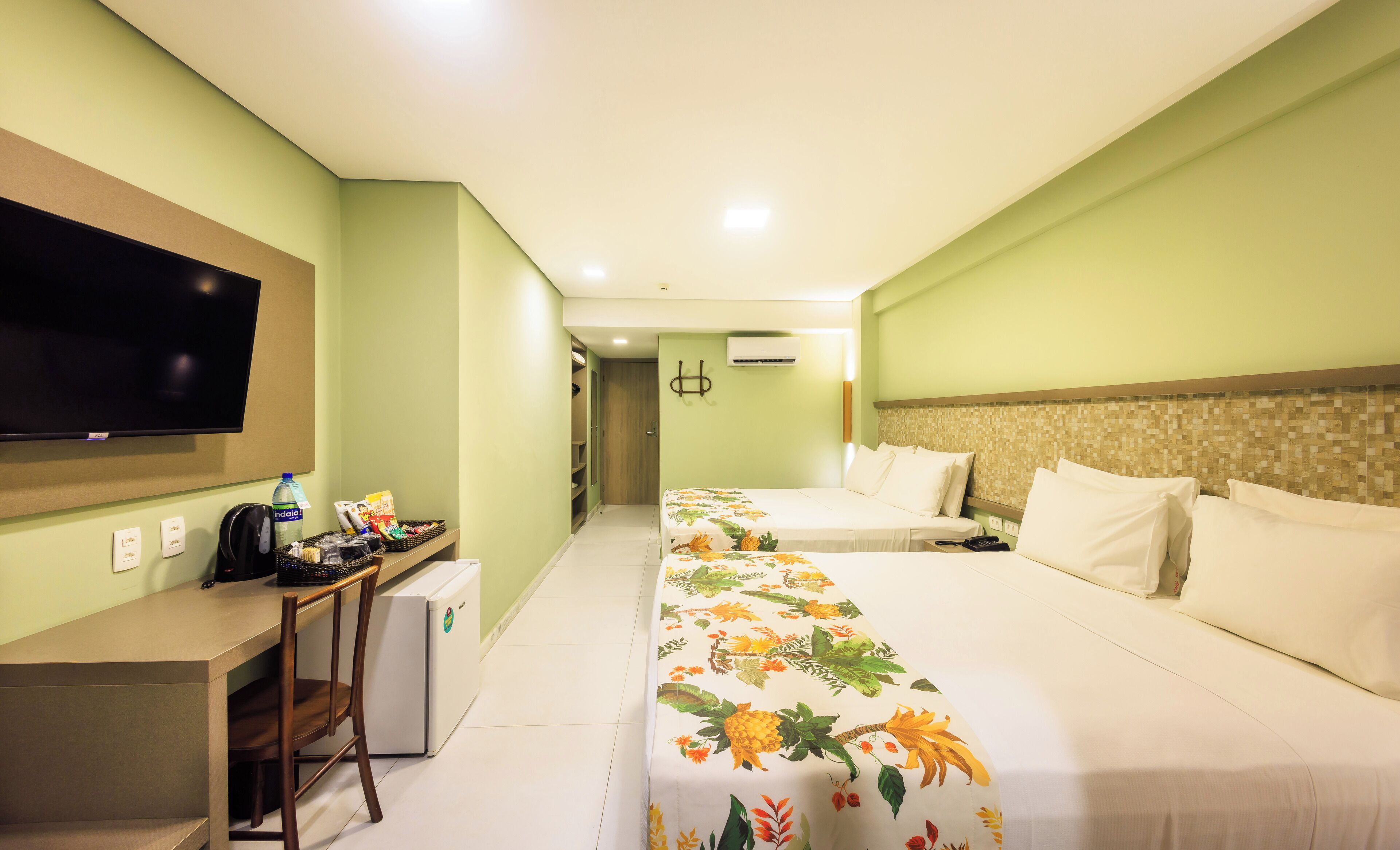 superior quadruple room | pillow-top beds, minibar, in-room safe, individually decorated