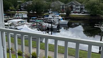 Enjoy serene marina views from the balcony with a tranquil atmosphere.