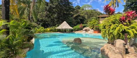 Outdoor pool, open 6 AM to 6 PM, pool loungers