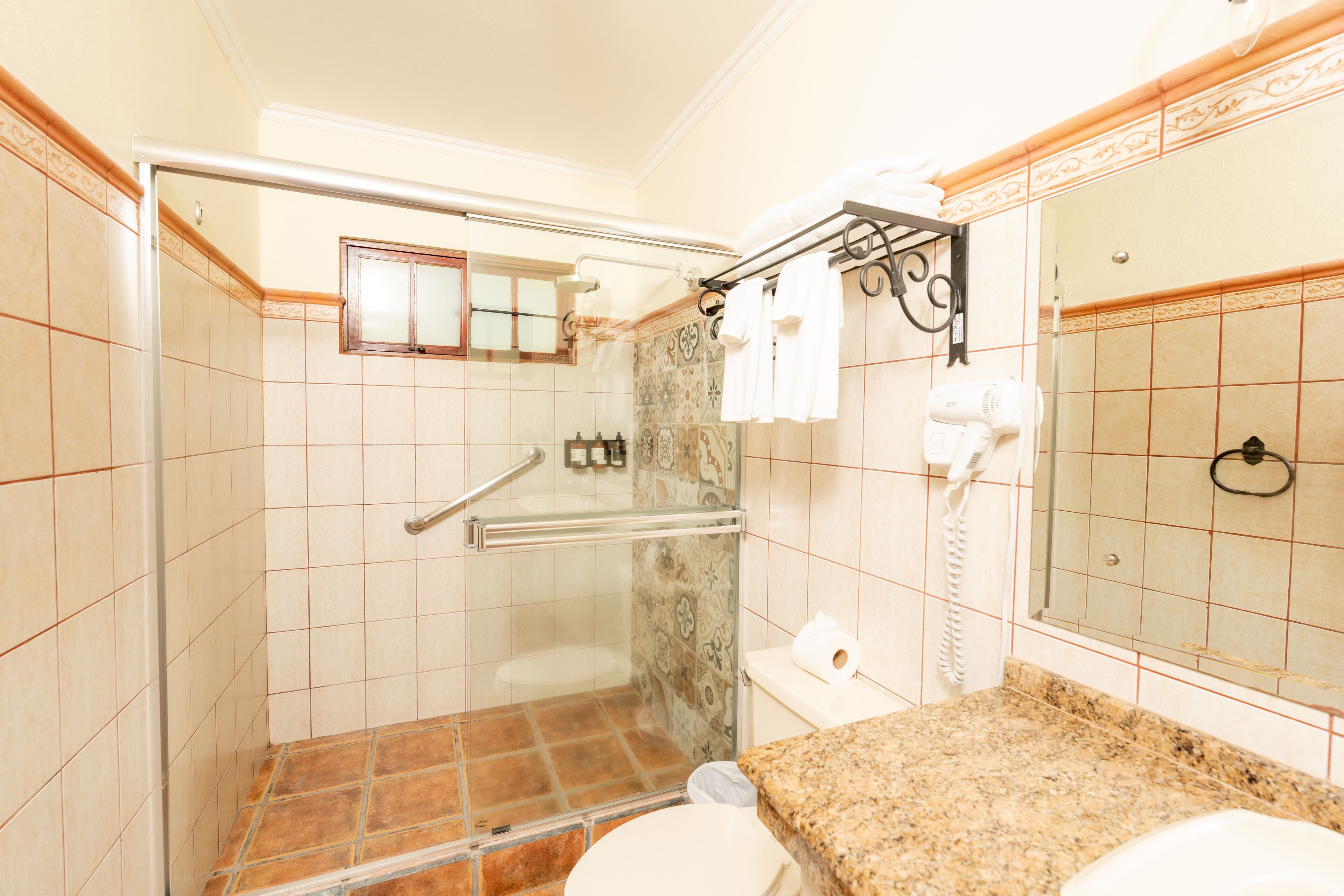 shower, eco-friendly toiletries, hair dryer, towels