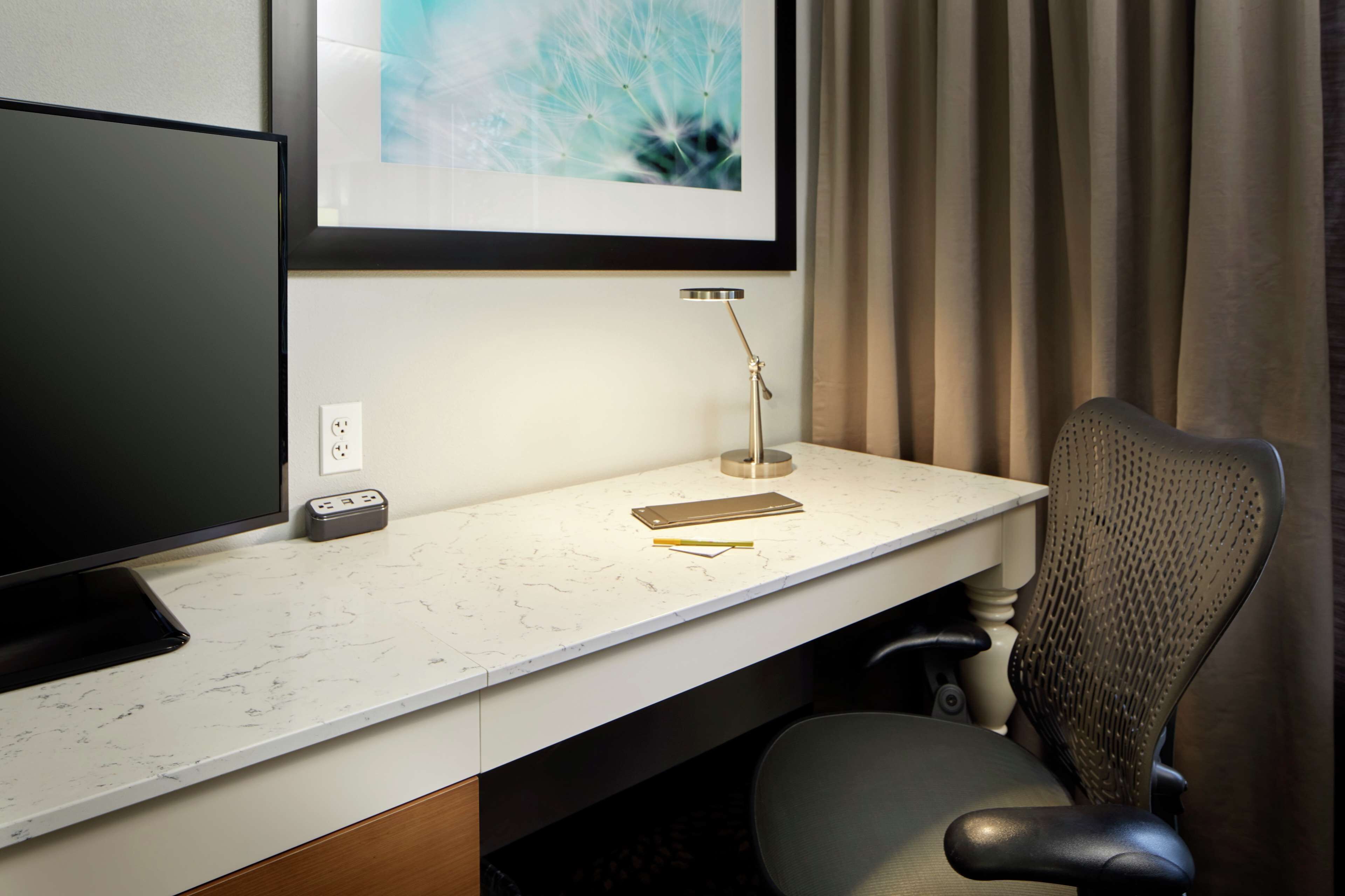 Desk, laptop workspace, blackout drapes, iron/ironing board