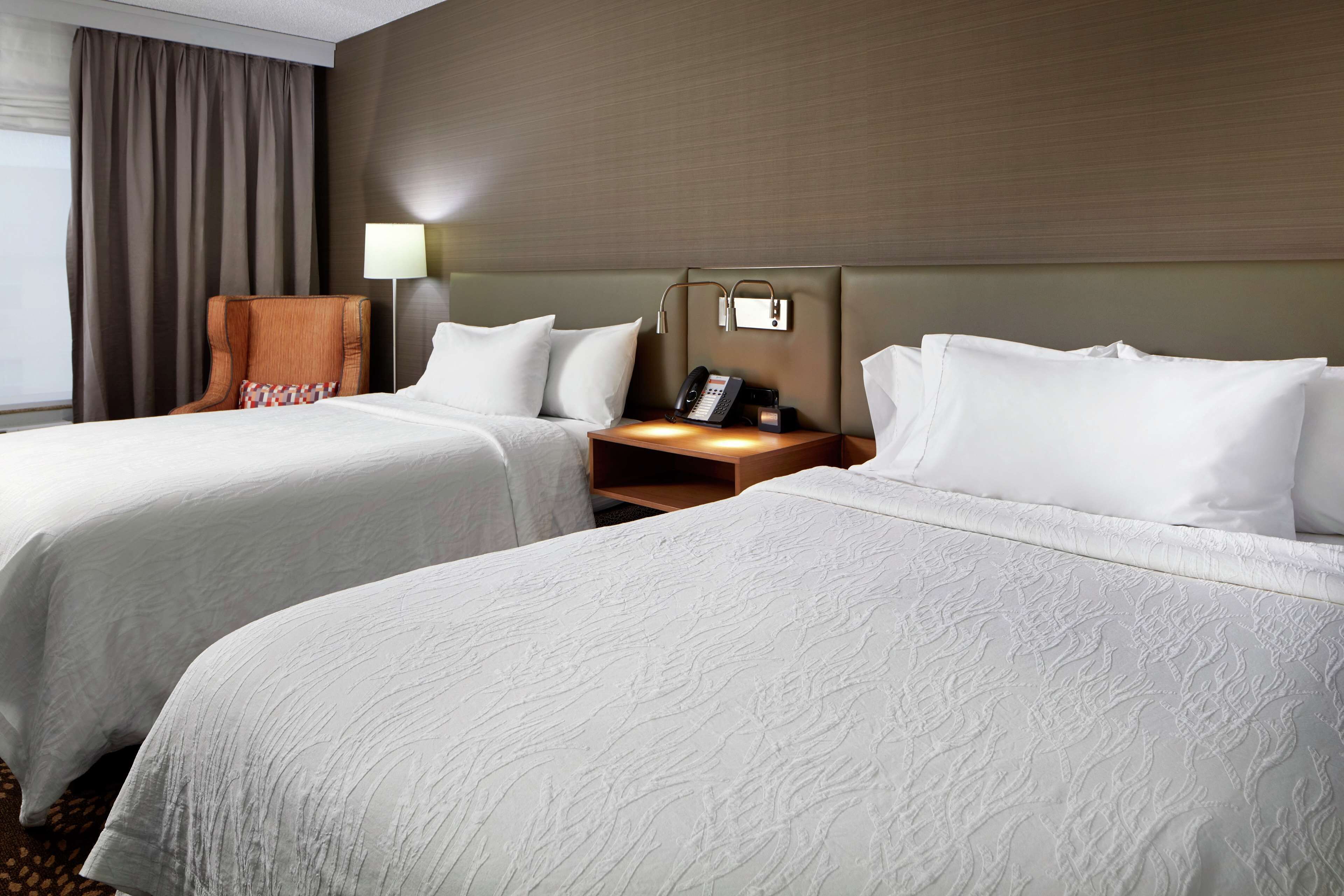 desk, laptop workspace, blackout curtains, iron/ironing board