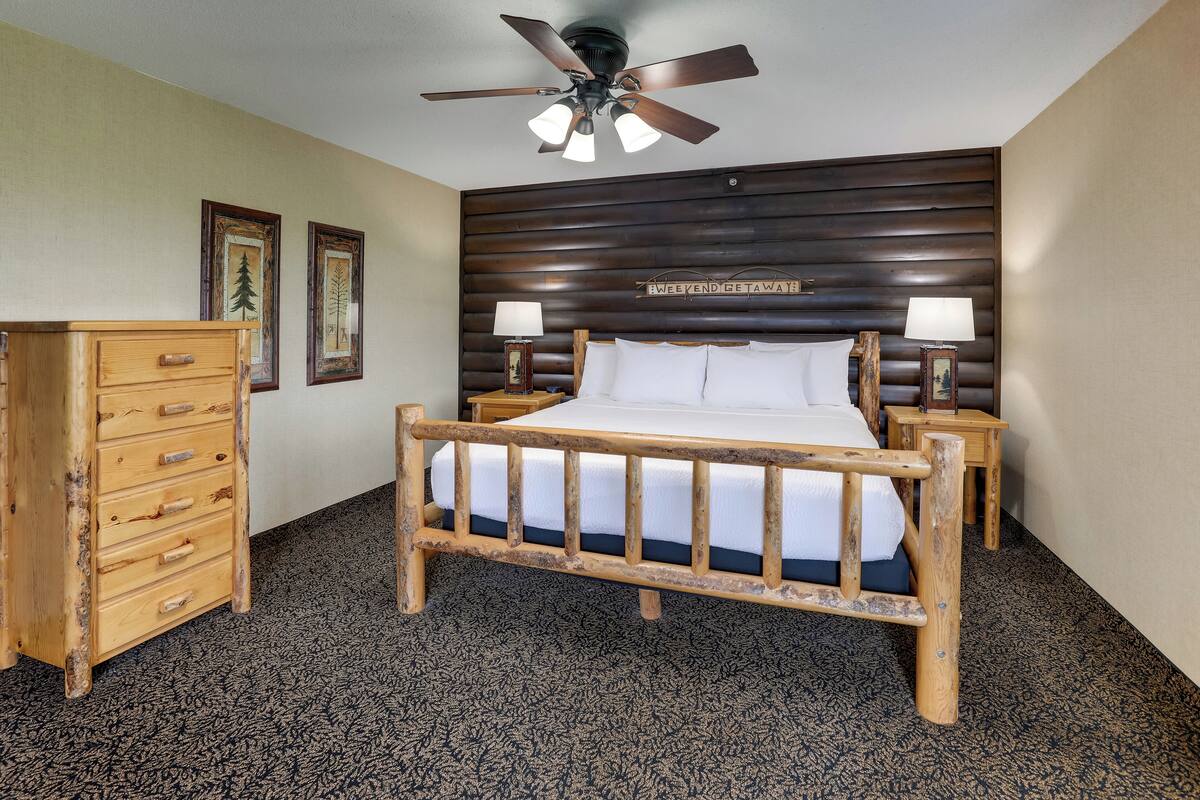 superior suite, 1 king bed with sofa bed, hot tub | desk, laptop workspace, iron/ironing board, free cots/infant beds