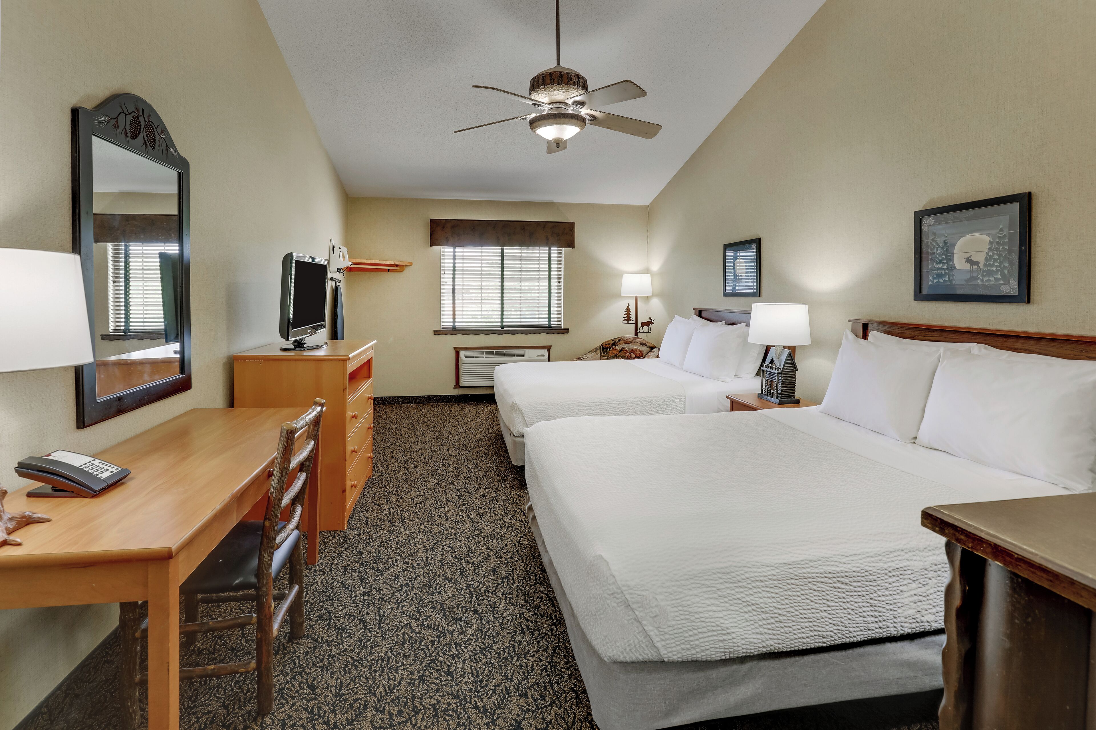 deluxe room, 2 queen beds | desk, laptop workspace, iron/ironing board, free cots/infant beds