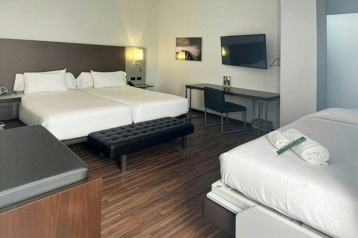 Family Room | Minibar, in-room safe, desk, laptop workspace