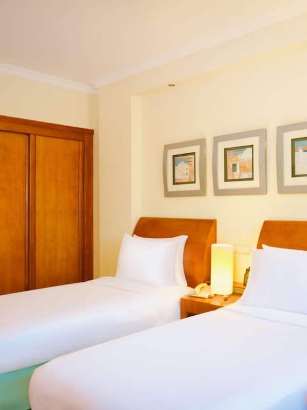 Premium bedding, minibar, in-room safe, laptop workspace