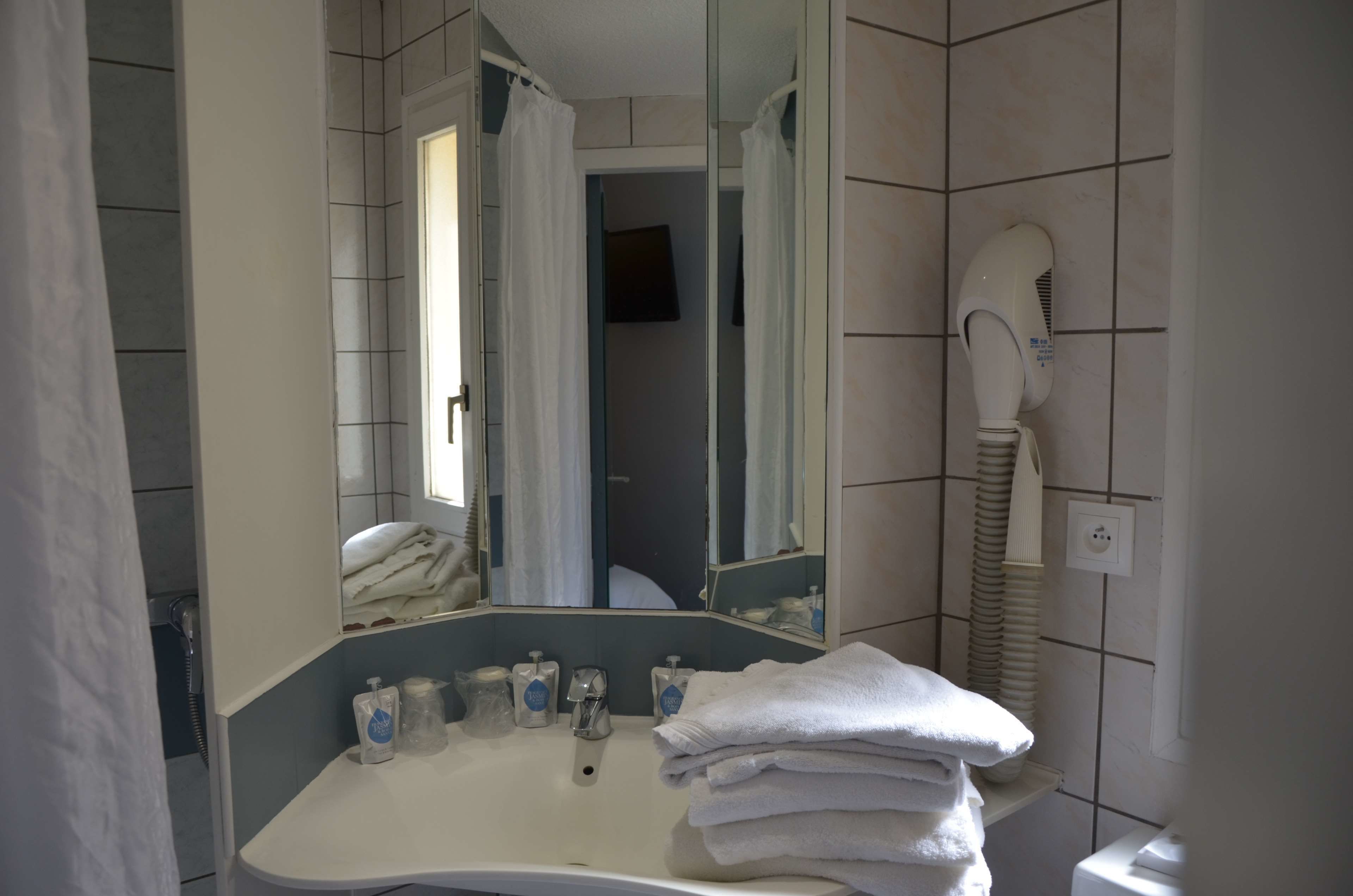 shower, eco-friendly toiletries, hair dryer, towels