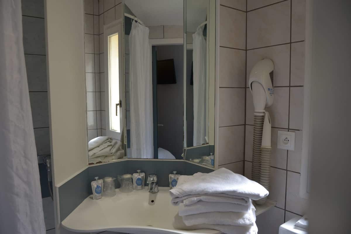 shower, eco-friendly toiletries, hair dryer, towels