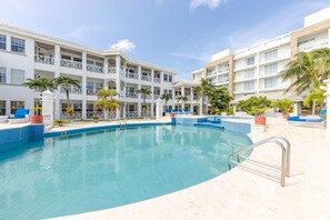 Outdoor pool, pool umbrellas, pool loungers