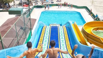 Enjoy thrilling water slides and relax on the adjacent beach.