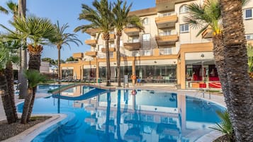 Outdoor pool, pool umbrellas, pool loungers
