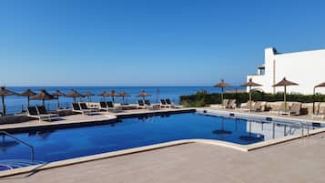 3 outdoor pools, open 10:00 AM to 6:00 PM, pool umbrellas, sun loungers