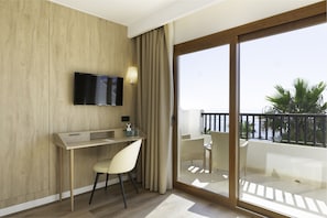 Suite, 1 Bedroom, Sea View (3 Adults) | 1 bedroom, in-room safe, desk, blackout drapes