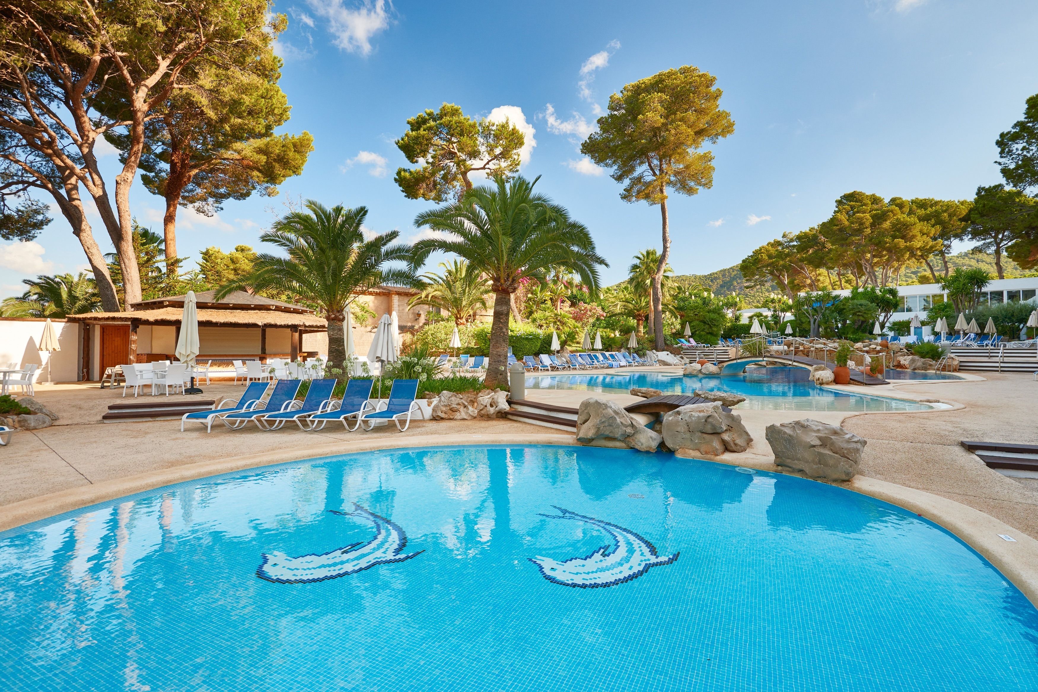 2 indoor pools, seasonal outdoor pool, pool umbrellas, pool loungers