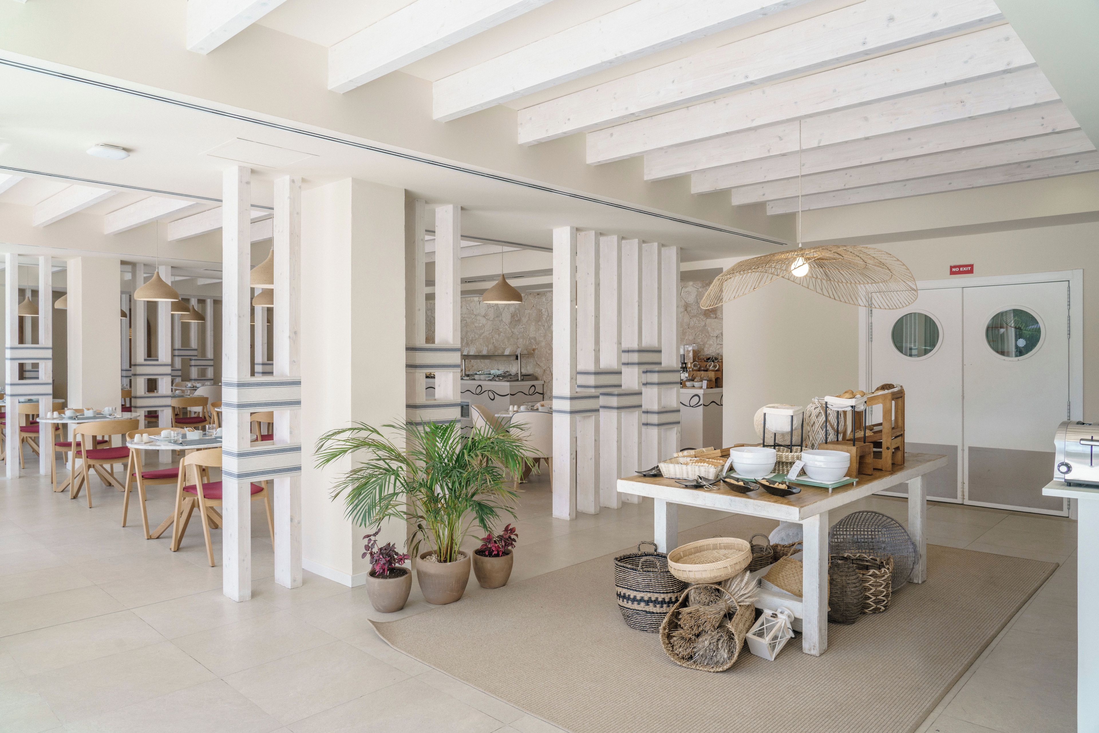 A spacious, modern interior with high ceilings and natural light.