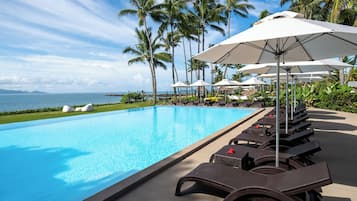 2 outdoor pools, pool umbrellas, pool loungers