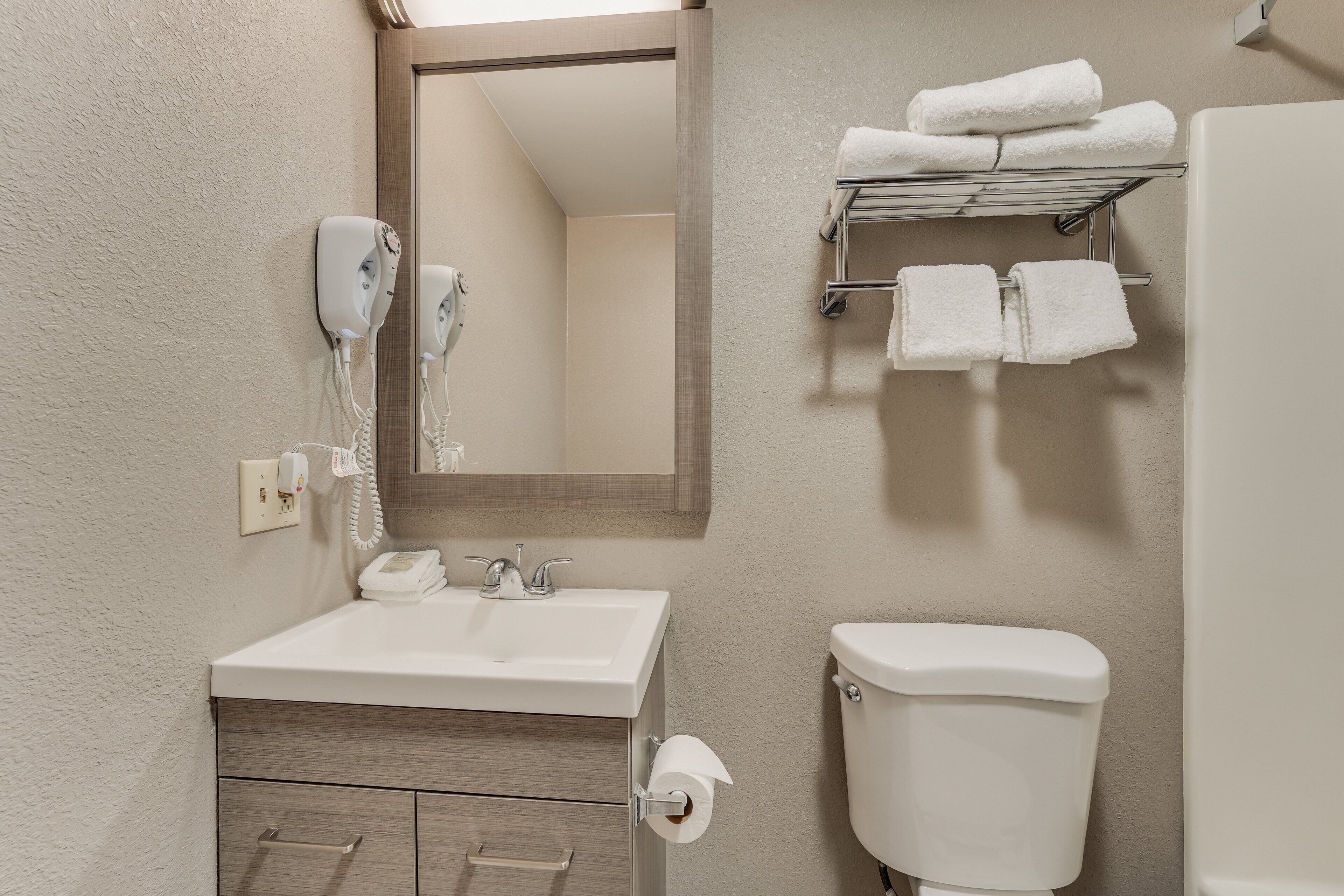 combined shower/bathtub, free toiletries, hair dryer, towels