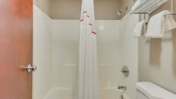 Standard Suite, 1 King Bed with Sofa bed, Non Smoking | Bathroom | Combined shower/tub, free toiletries, hair dryer, towels