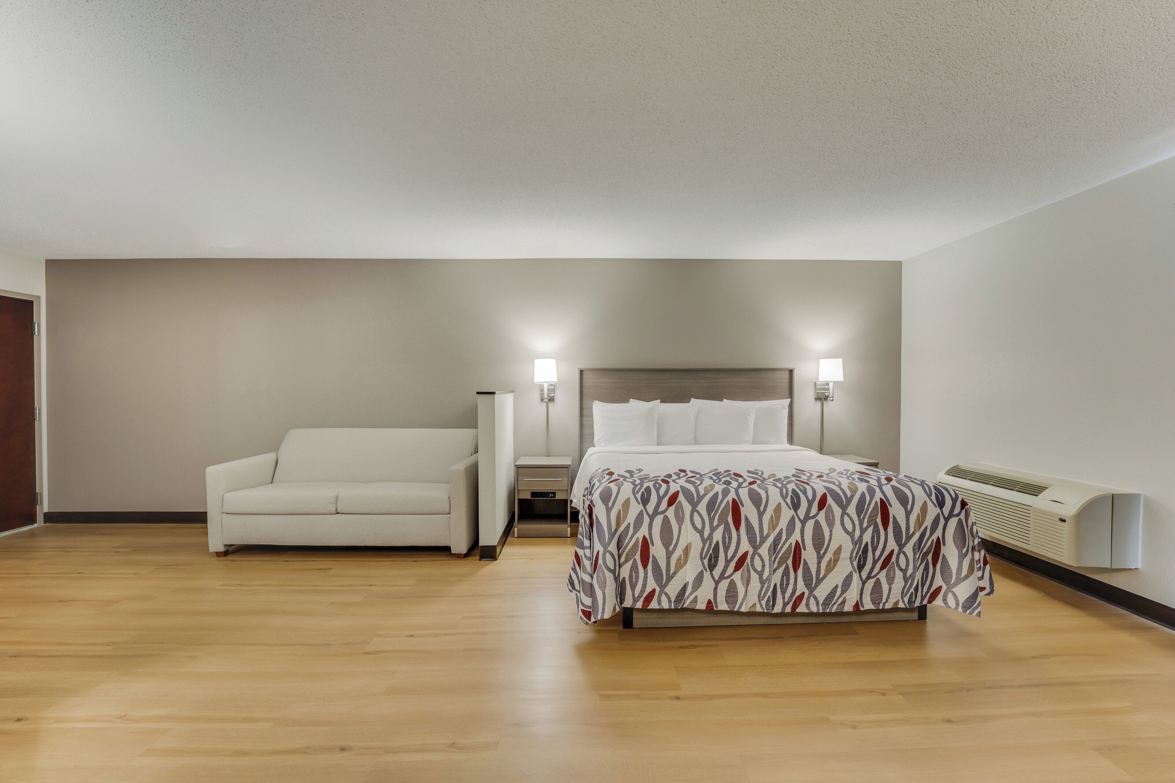 Standard Suite, 1 King Bed with Sofa bed, Non Smoking | Desk, laptop workspace, blackout drapes, iron/ironing board