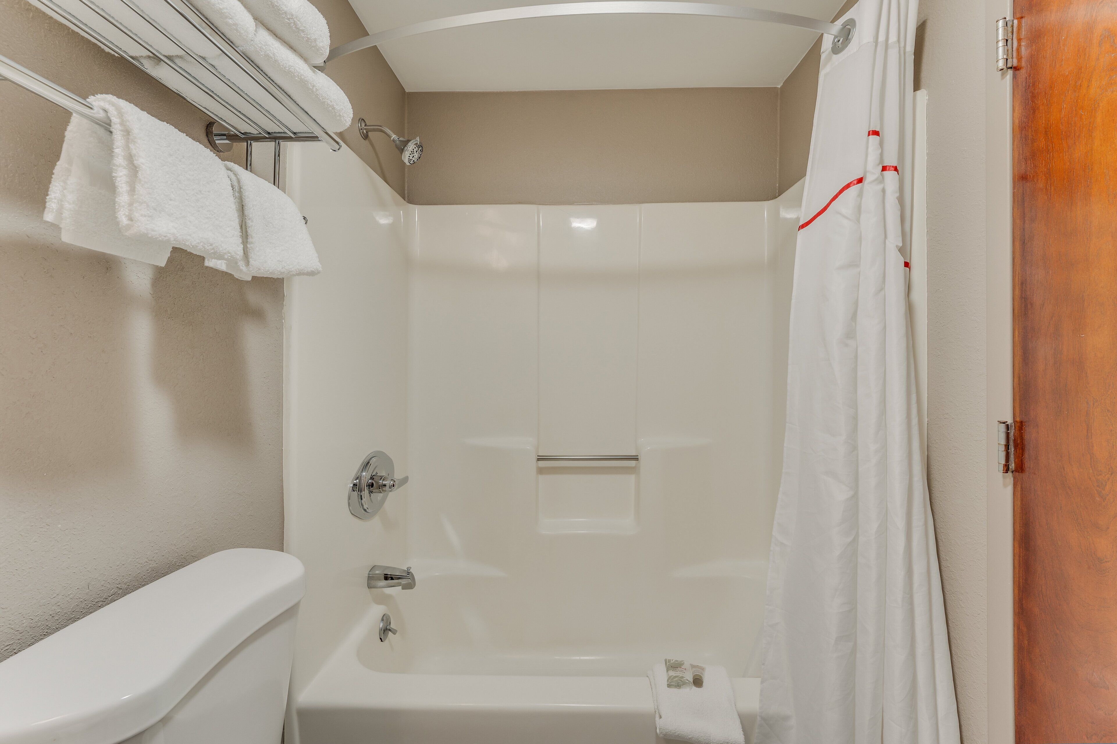 combined shower/bathtub, free toiletries, hair dryer, towels