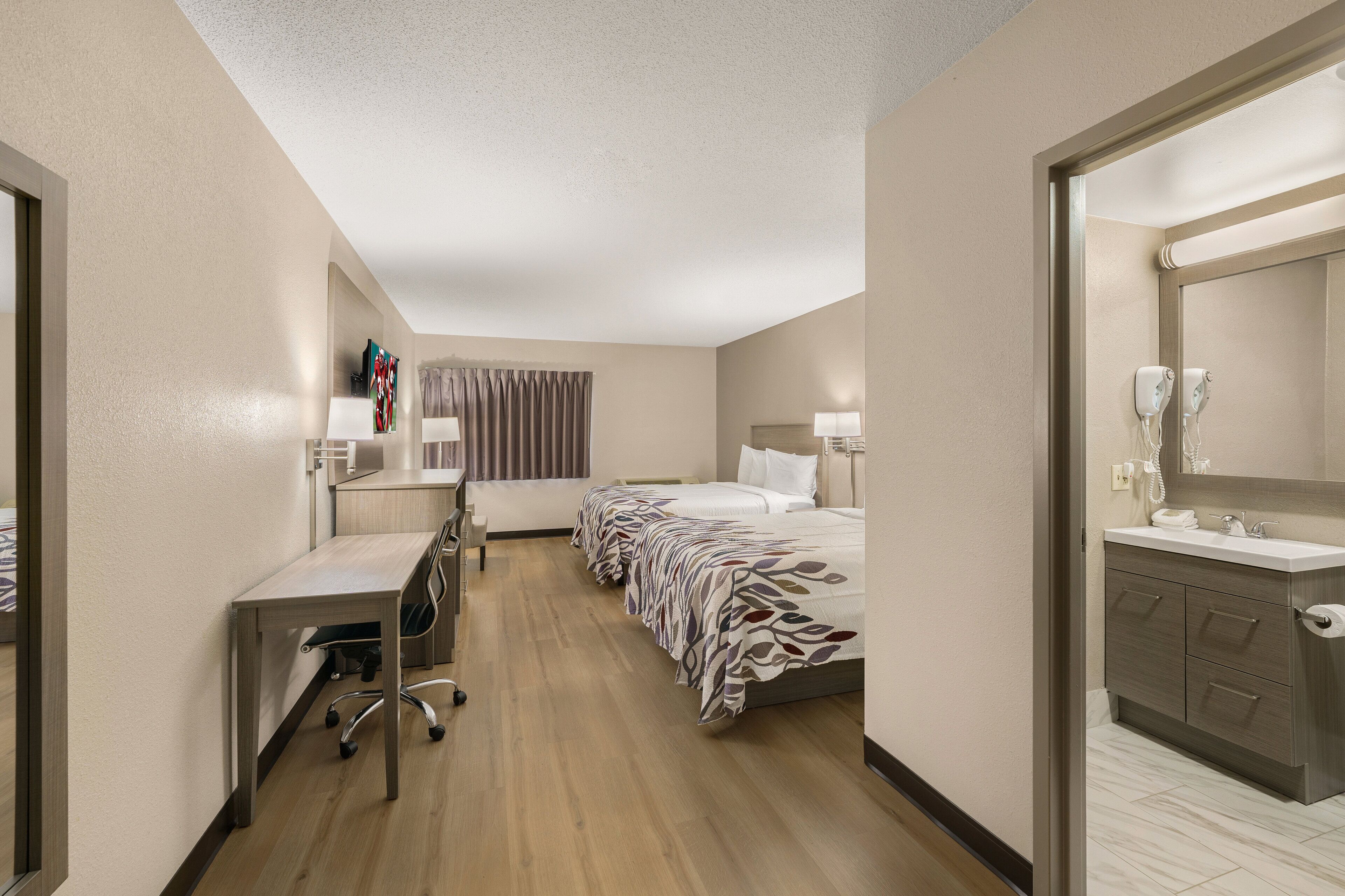 standard room, 2 queen beds, non smoking | 1 bedroom, desk, laptop workspace, blackout curtains