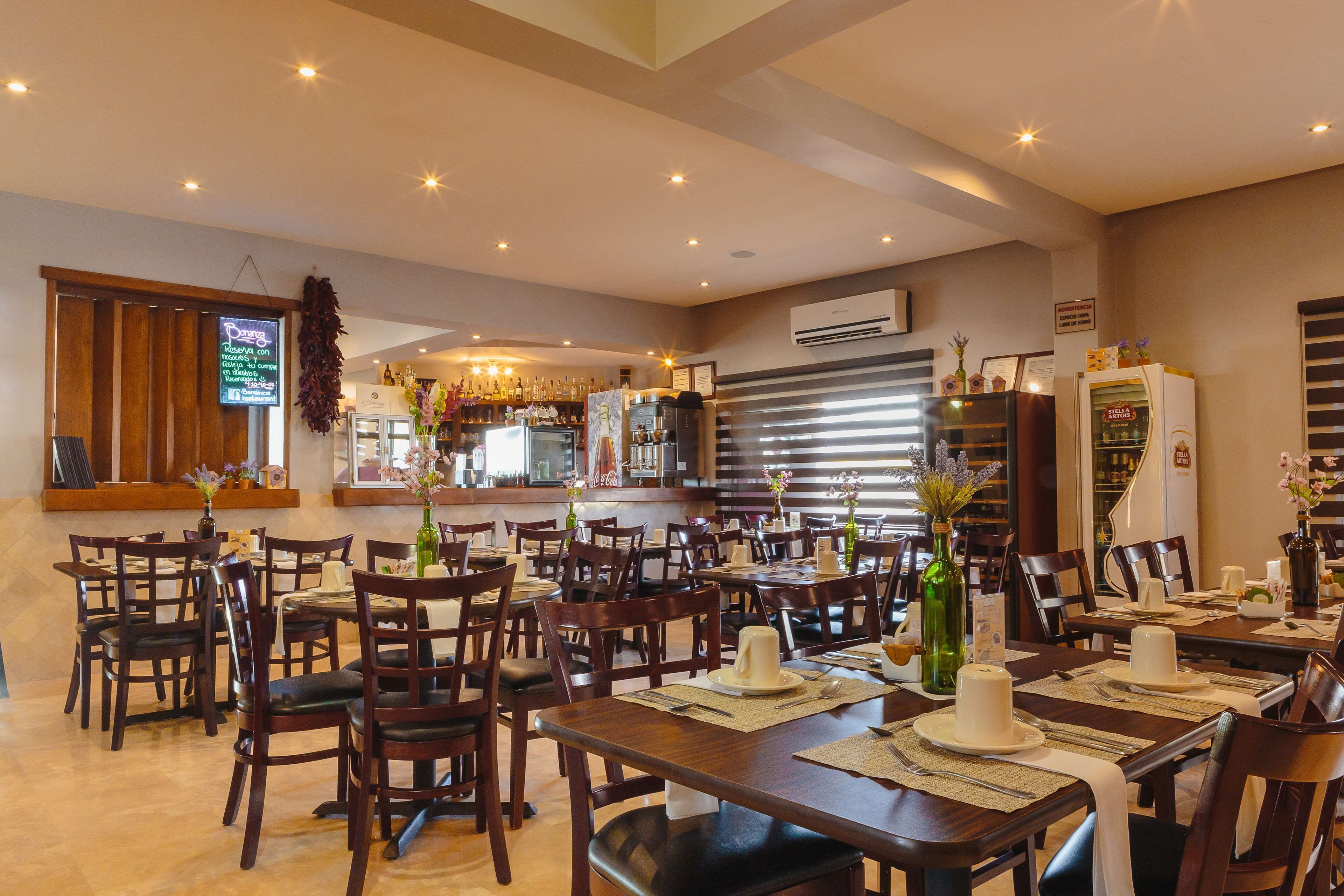 Breakfast, lunch served; international cuisine, al fresco dining 