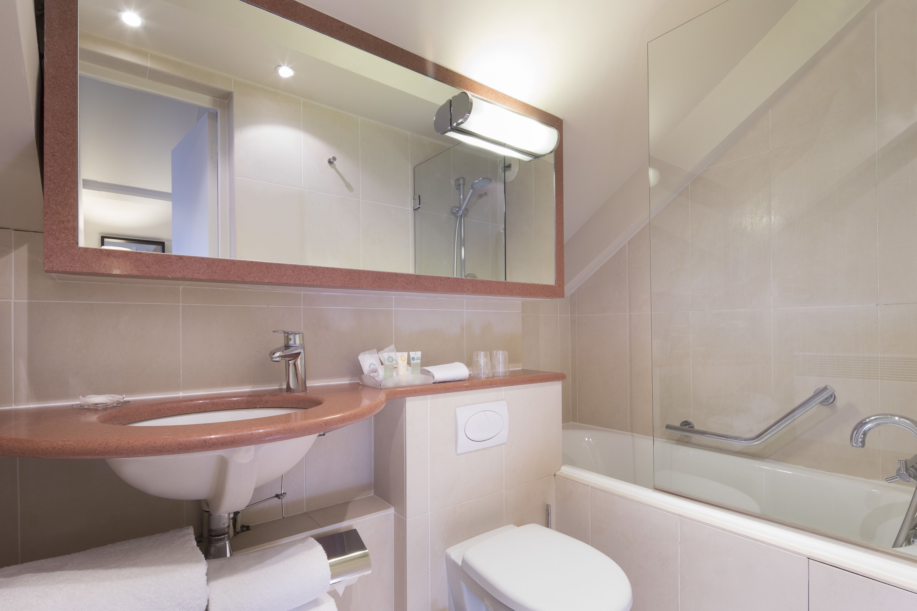 junior suite | bathroom | combined shower/bathtub, hair dryer, towels