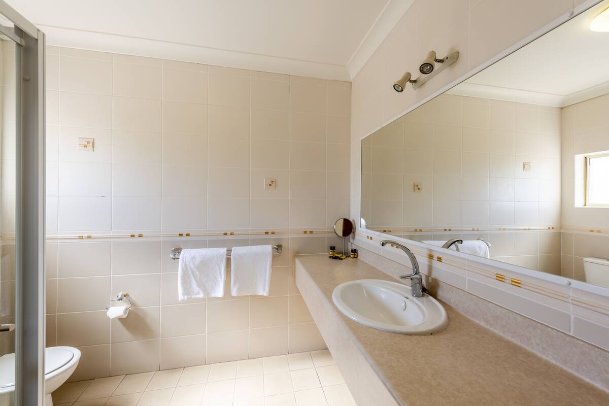 deluxe room, multiple beds, non smoking (upstairs) | bathroom | eco-friendly toiletries, hair dryer, towels