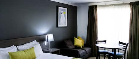 Suite, 1 King Bed, Non Smoking (Dining Table) | Premium bedding, minibar, desk, blackout curtains