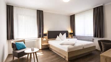 Hypo-allergenic bedding, down duvets, minibar, in-room safe