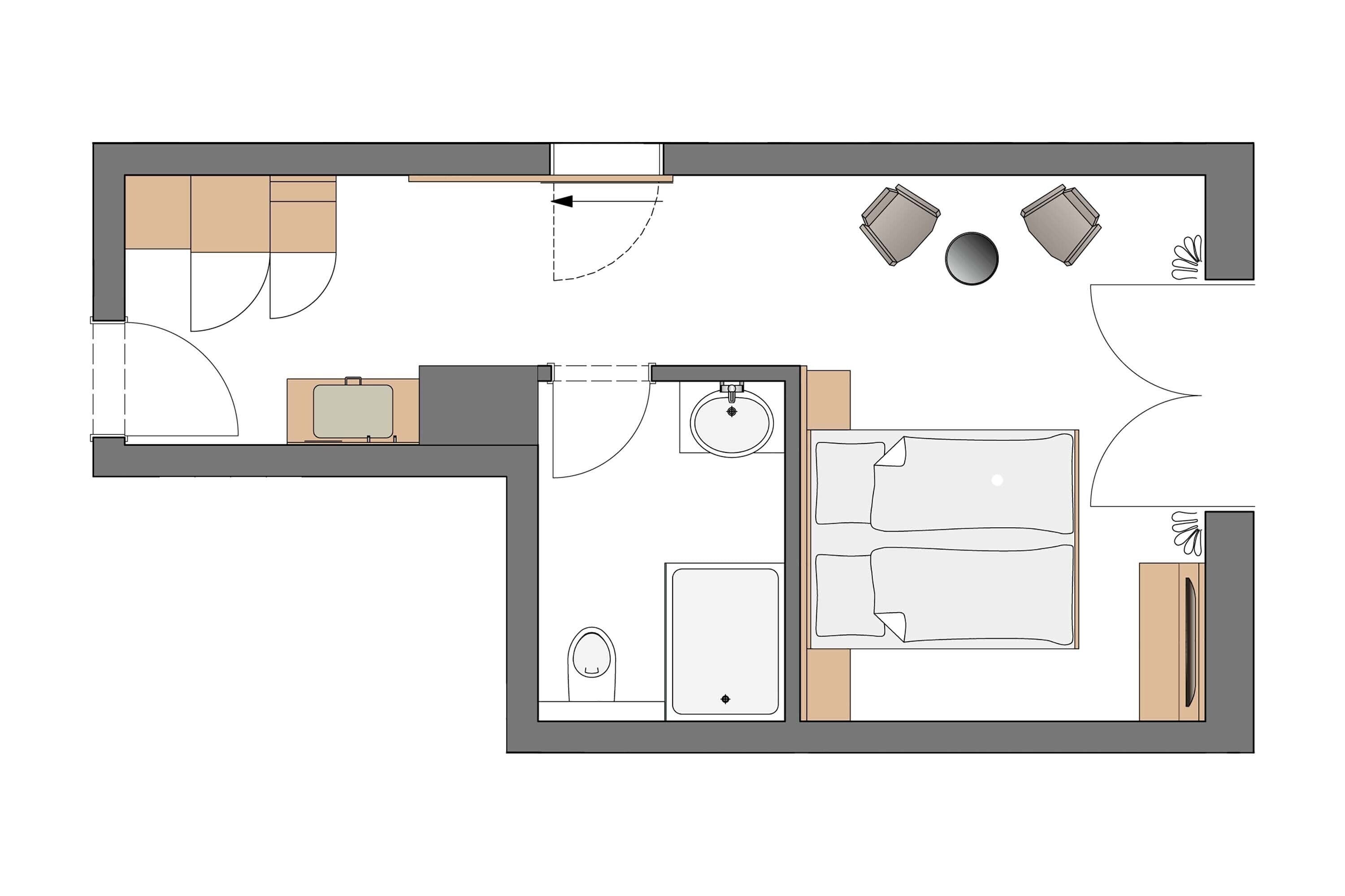 A hotel room layout with a bed, a desk, a chair, a small bathroom, and a seating area with two chairs and a table.