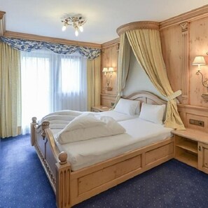 Literie hypoallergénique, minibar, coffres-forts dans les chambres